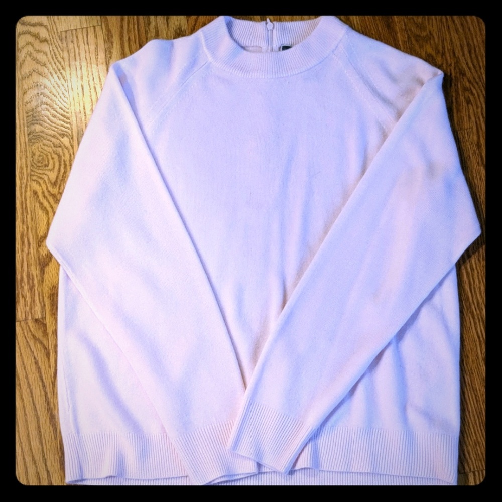 Soft pink colored sweater top